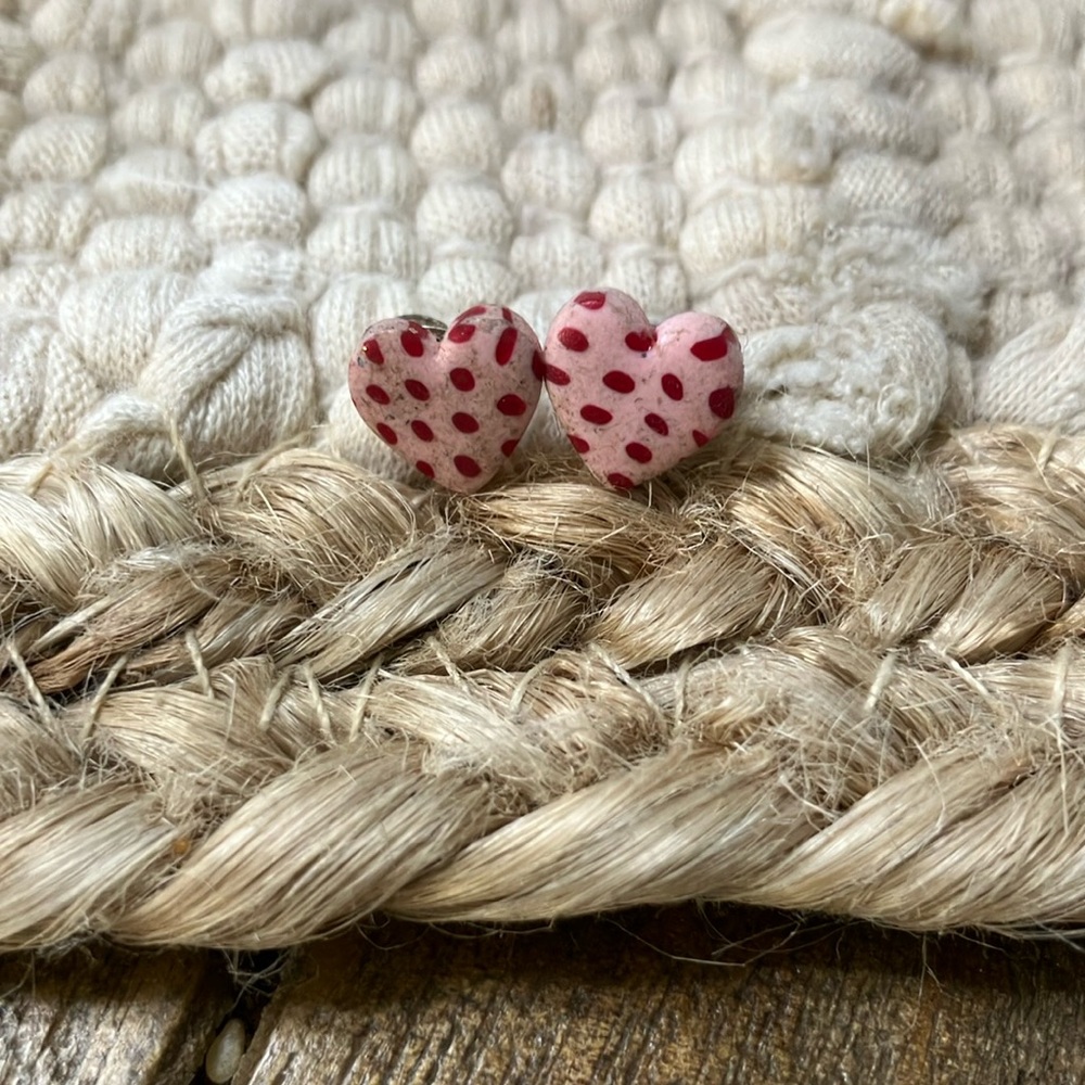 Heart pink clay earrings with red polka dots. 1/4 inches.